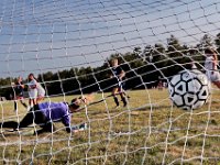 Apponequett's Elzabeth Anderson can be celebrating her goald, left, as the ball sails past Fairhaven goalie A. Gamache during Fairhaven at Apponequett girls soccer.  [ PETER PEREIRA/THE STANDARD-TIMES/SCMG ]