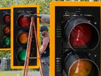 Crews install a set of new traffic lights a the intersection of Route 18 and South Street, as part of the Route 18 second phase changes.  [ PETER PEREIRA/THE STANDARD-TIMES/SCMG ]