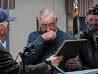 Russel T. Hart becomes emotional after receiving a citation from Senior Vice-Commander, Tony Vieira, honoring him for fifty years of continuous membership at the Westport American Legion Post 145. PETER PEREIRA/The Standard-Times
