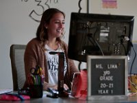 Courtney Lima enjoys a light moment as she does an attendance roll call on the first day of school, and her first day as a teacher.  Courtney Lima who attended the Taylor School in New Bedford as a student for grades K-6, returns for her first day of school, this time as a third grade teacher. Ms. Lima will be teaching third graders virtually this year, as part of the Distance Learning Academy for students who opted to stay home for this school year.  PHOTO PETER PEREIRA