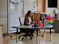 Alone in her classroom, Courtney Lima conducts her first day as a teacher virtually with her third grade students. Courtney Lima who attended the Taylor School in New Bedford as a student for grades K-6, returns for her first day of school, this time as a third grade teacher. Ms. Lima will be teaching third graders virtually this year, as part of the Distance Learning Academy for students who opted to stay home for this school year.  PHOTO PETER PEREIRA