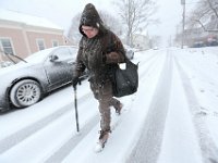 ma nb_ N8A6348  Without a car, Anne Correia braves a snow storm, as she walks to be next to her mother who is gravely ill at a nursing home 6 blocks from her home in Fairhaven, MA.   /THE STANDARD-TIMES/SCMG : snow, weather, storm, blizzard
