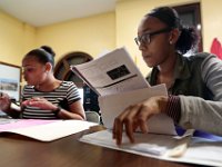 ma nb_ N8A0396  Family engagement specialist, Amanda Gonzalez, left, works with Shanyra Jenkins, 17, on her homework during their weekly guidance session at the Whaling City Alternative School in New Bedford.   PETER PEREIRA/THE STANDARD-TIMES/SCMG : education, school, class, classroom, work