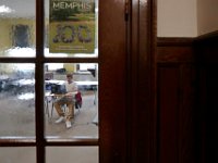 ma nb_ N8A0464  David Lima, 16, is seen through the glass pane of the door to his history class at the Whaling City Alternative School in New Bedford.   PETER PEREIRA/THE STANDARD-TIMES/SCMG : education, school, class, classroom, work