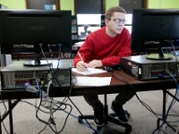 ma nb WhalingCitySchool  Alex Roman works on his history research paper on the whaleship Essex in class at the Whaling City Alternative School in New Bedford.   PETER PEREIRA/THE STANDARD-TIMES/SCMG : education