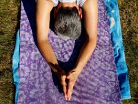 Rachelle Lemieux stretches in a yoga classs as part of the Summer Yoga Series held at the DNRT  Slocums River Reserve on Horseneck Road in Dartmouth.   [ PETER PEREIRA/THE STANDARD-TIMES/SCMG ]