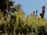 Instructor Tracy Clarke, leads participants in a yoga classs as part of the Summer Yoga Series held at the DNRT  Slocums River Reserve on Horseneck Road in Dartmouth.   [ PETER PEREIRA/THE STANDARD-TIMES/SCMG ]