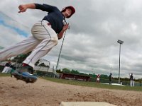 ma nb_ N8A0028  Mike Goren from Weatbury, NY runs around first base as the Bay Sox have their first team practice as they prepare for the season at Paul Walsh Field in New Bedford, MA.  PETER PEREIRA/THE STANDARD-TIMES : sports, baseball