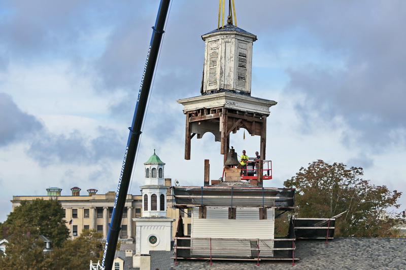 Crews remove the steeple of the iconic First Baptist Church in New Bedford, MA.  The First Baptist Church was constructed in 1829 and has been designated a National Treasure by the National Trust for Historic Preservation since 2015.    PHOTO PETER PEREIRA