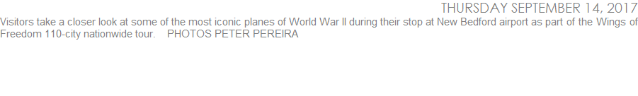 Visitors take a closer look at some of the most iconic planes of World War II during their stop at New Bedford airport as part of the Wings of Freedom 110-city nationwide tour.  PHOTOS PETER PEREIRA