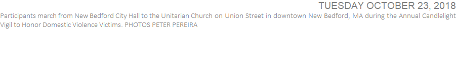 Participants march from New Bedford City Hall to the Unitarian Church on Union Street in downtown New Bedford, MA during the Annual Candlelight Vigil to Honor Domestic Violence Victims. PHOTOS PETER PEREIRA