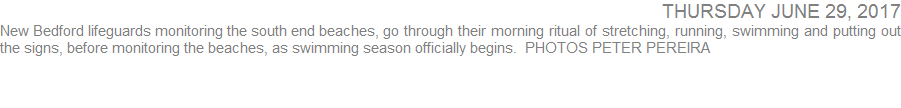 New Bedford lifeguards monitoring the south end beaches go through their morning ritual of stretching, running, swimming and putting out the signs, before monitoring the beaches, as swimming season officially begins. 