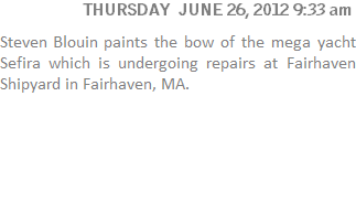 Steven Blouin paints the bow of the mega yacht Sefira which is undergoing repairs at Fairhaven Shipyard in Fairhaven, MA. 