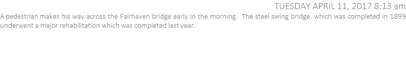 A pedestrian makes his way across the Fairhaven bridge early in the morning.  The steel swing bridge, which was completed in 1899 underwent a major rehabilitation which was completed last year.