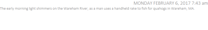 The early morning light shimmers on the Wareham River, as a man uses a handheld rake to fish for quahogs in Wareham, MA