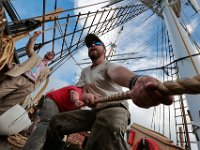 _N8A1822  PHOTO PETER PEREIRA/The Standard-Times  ++ Deckhand Dan Roche pulls the anchor up before casting off from Mystic, CT.   The Charles W. Morgan whaleship makes her way from Mystic Seaport in Mystic, CT to New London, CT in the first leg of the journey that will see it return to New Bedford in June.