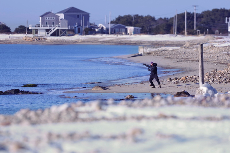 A man performs Tai-Chi on East Beach in Westport, MA on a cold morning. PHOTO PETER PEREIRA