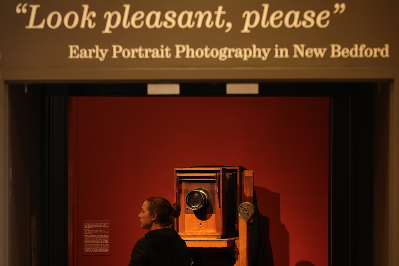 Manuel Goulart's studio camera and lens (circa 1888) capture the moment when a visitor enters the new exhibit 