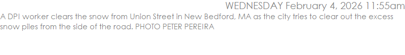 A DPI worker clears the snow from Union Street in New Bedford, MA as the city tries to clear out the excess snow piles from the side of the road. PHOTO PETER PEREIRA
