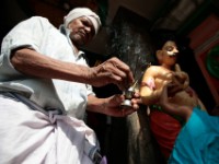 MG 1862  Daily life in the Dharbi slum in Mumbai, India.  The Dharbi slum is one of the largest in India and contains an entire ecosystem that offers residents the ability to never leave. : India