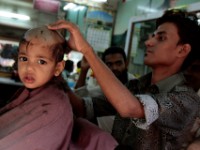 MG 1965  Daily life in the Dharbi slum in Mumbai, India.  The Dharbi slum is one of the largest in India and contains an entire ecosystem that offers residents the ability to never leave. : India