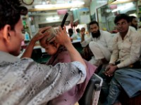 MG 1971  Daily life in the Dharbi slum in Mumbai, India.  The Dharbi slum is one of the largest in India and contains an entire ecosystem that offers residents the ability to never leave. : India