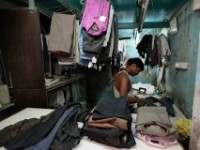 MG 2015  Daily life in the Dharbi slum in Mumbai, India.  The Dharbi slum is one of the largest in India and contains an entire ecosystem that offers residents the ability to never leave. : India