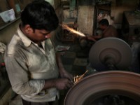 MG 2029  Daily life in the Dharbi slum in Mumbai, India.  The Dharbi slum is one of the largest in India and contains an entire ecosystem that offers residents the ability to never leave. : India