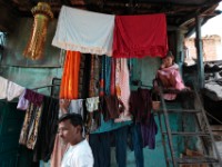 MG 2061  Daily life in the Dharbi slum in Mumbai, India.  The Dharbi slum is one of the largest in India and contains an entire ecosystem that offers residents the ability to never leave. : India