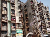 MG 2068  Daily life in the Dharbi slum in Mumbai, India.  The Dharbi slum is one of the largest in India and contains an entire ecosystem that offers residents the ability to never leave. : India