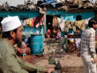 MG 2074  Daily life in the Dharbi slum in Mumbai, India.  The Dharbi slum is one of the largest in India and contains an entire ecosystem that offers residents the ability to never leave. : India